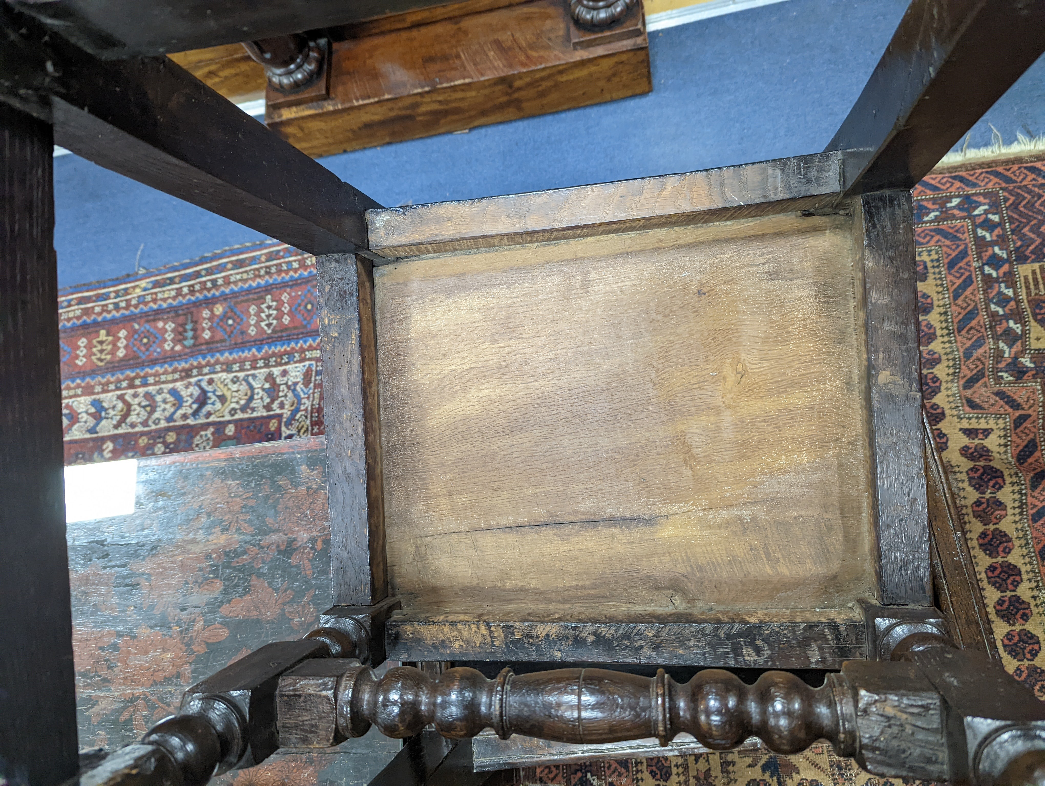 A pair of 17th century Lancashire carved oak side chairs, width 45cm, depth 39cm, height 101cm